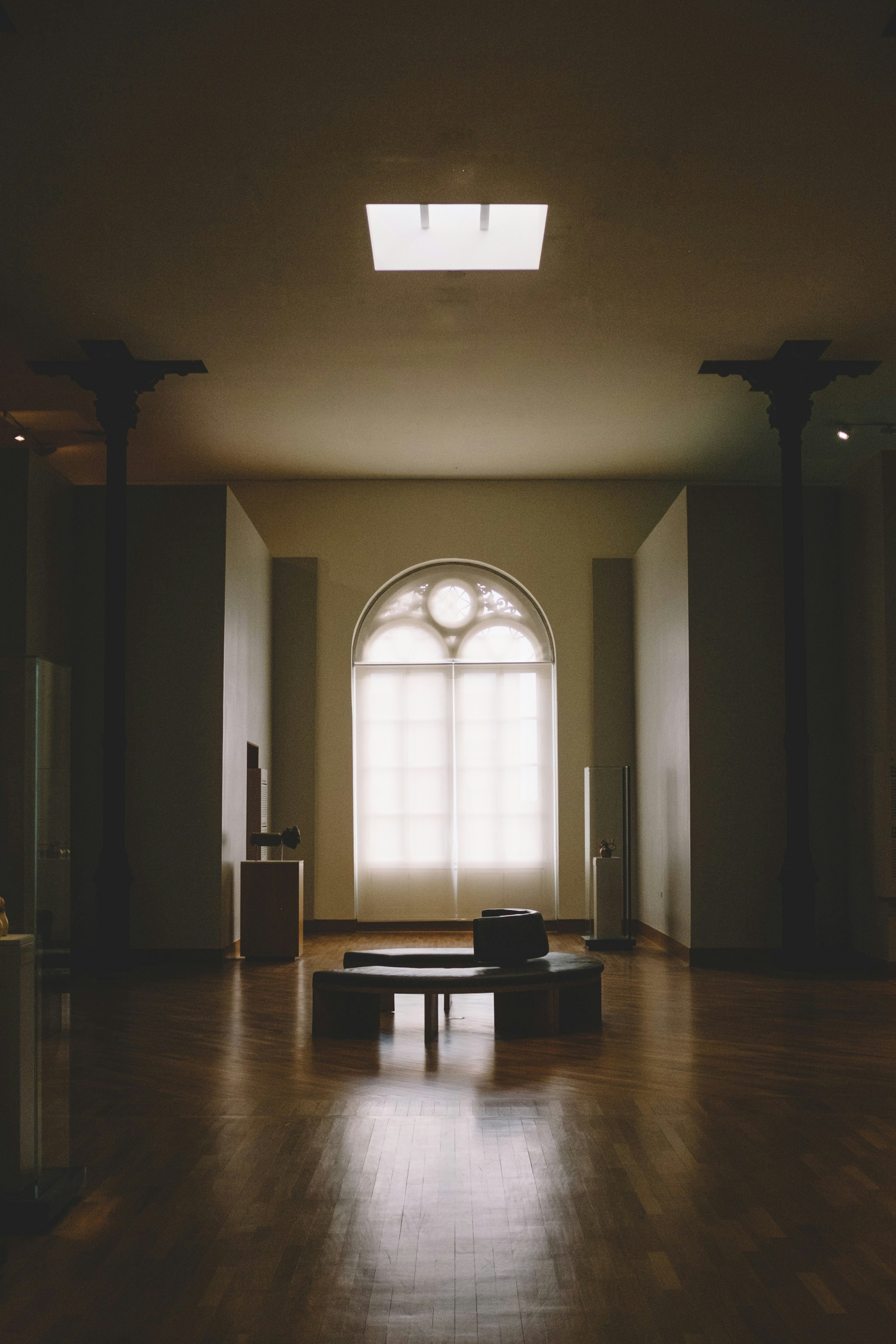 black wooden table near window